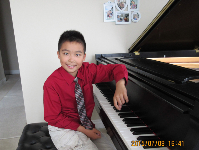 Jason获全加钢琴赛10岁组第一。(记者沈丹心／摄影)